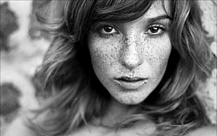 grayscale photo of woman's face