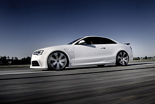 white Audi Coupe during daytime
