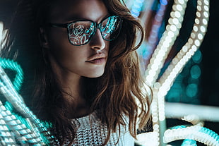 woman in black framed eyeglasses macro photography