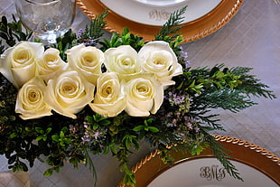 white flowers on table top indoors