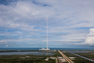 brown runway, SpaceX, rocket, long exposure, clouds