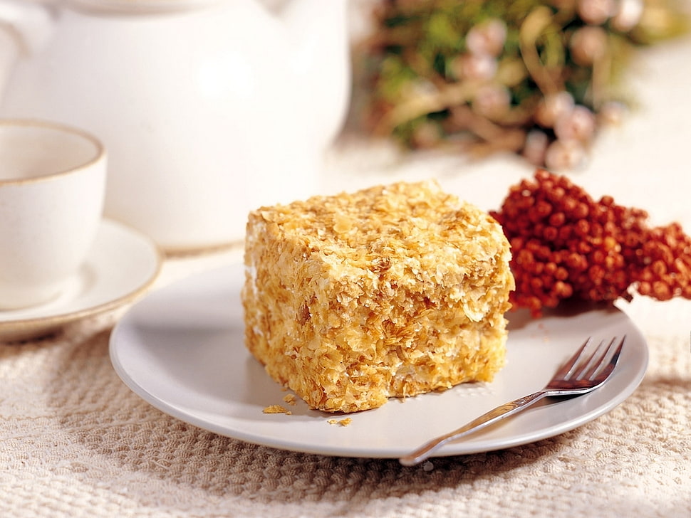 baked cake on white saucer with fork HD wallpaper