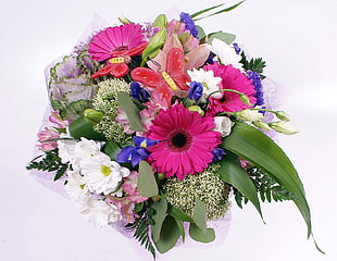 pink and white Daisies with purple Irises and pink Lilies bouquet