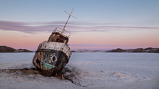 brown and white concrete house, boat, ice, wreck, landscape