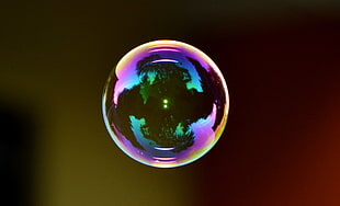 focal photography of iridescent bubble