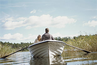 couple on white boat HD wallpaper