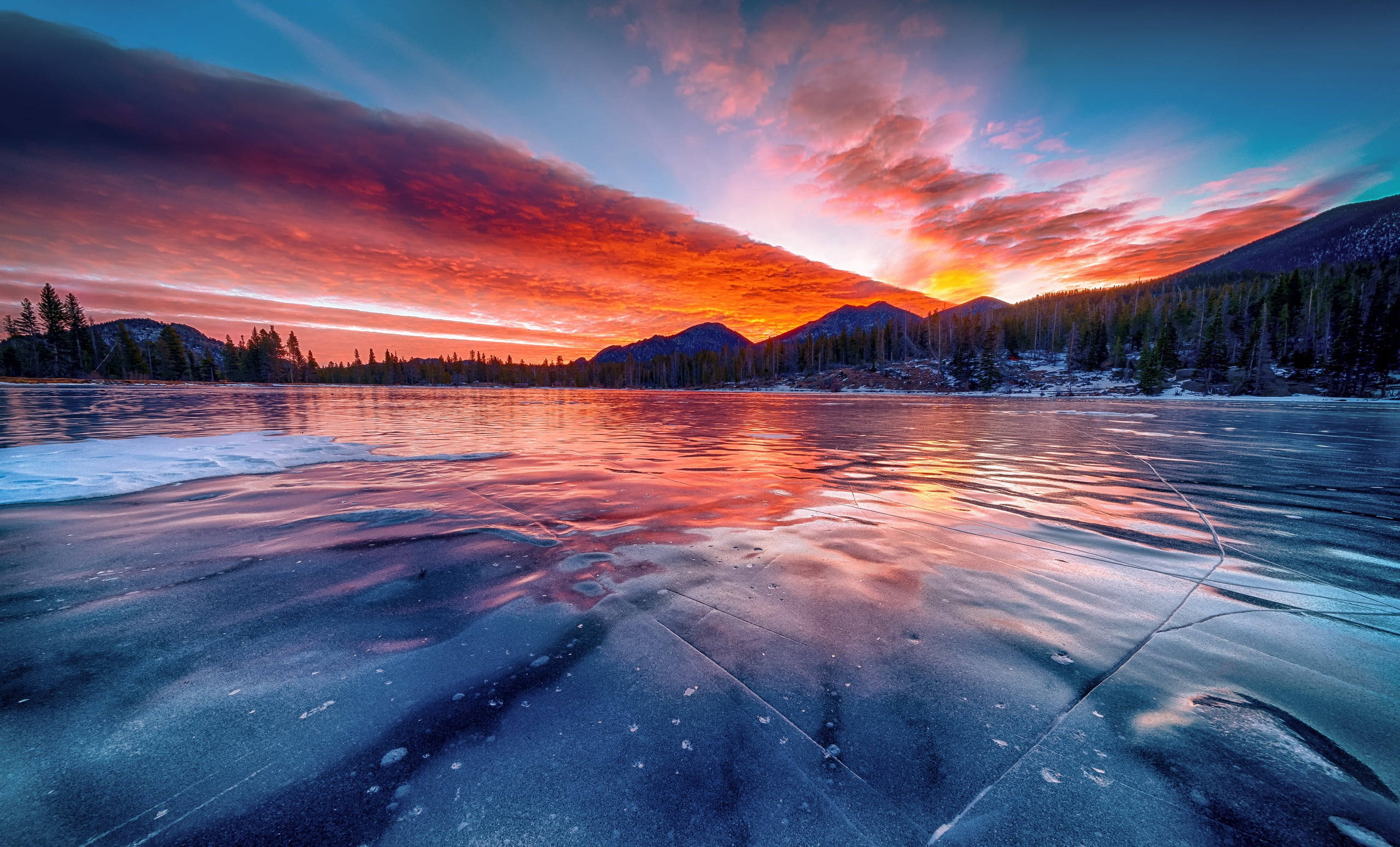 frozen body of water during golden hour