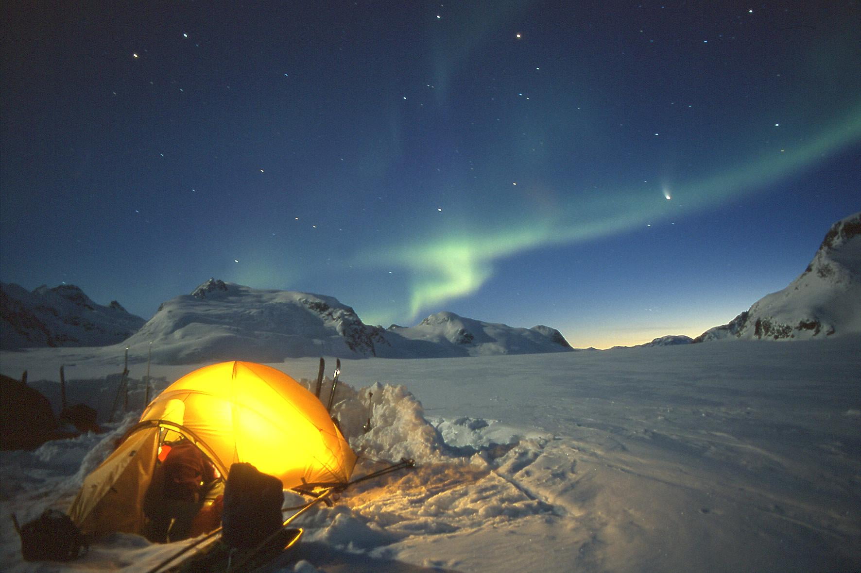 yellow outdoor tent under Aurora Borealis, greenland