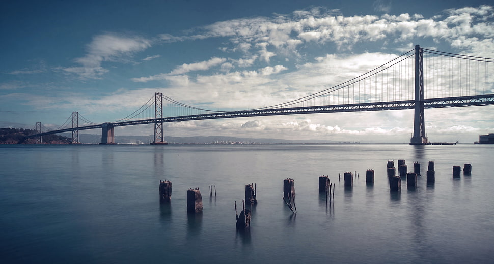 bridge under clear blue sky HD wallpaper