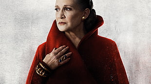 photo of woman wearing red coat