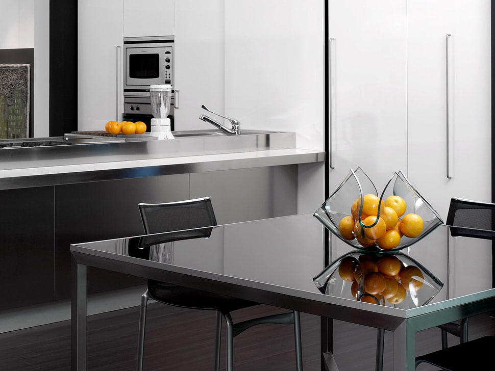 rectangular glass top dining table set with orange fruits HD wallpaper