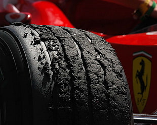 damaged F-1 car vehicle tire, Formula 1, Ferrari, tires, racing