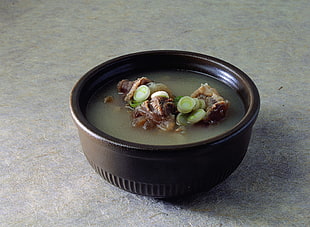 soup on brown ceramic bowl