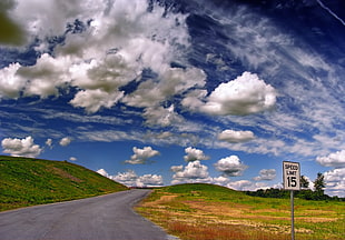 grey concrete road under white cloudy sky during daytime HD wallpaper