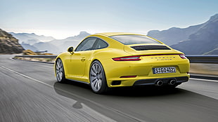 yellow Porsche sports car HD wallpaper