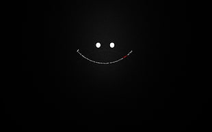 smiley drawing on black background