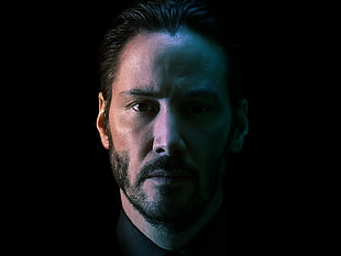 Keanu Reeves in black background HD wallpaper