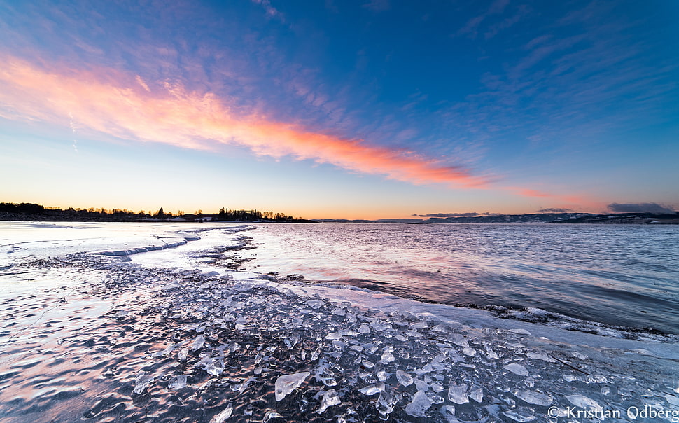 ground with ice shards during daytime HD wallpaper