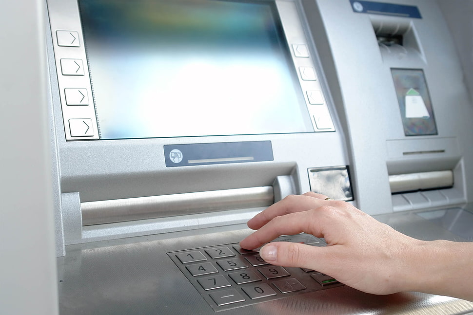 person using gray ATM HD wallpaper