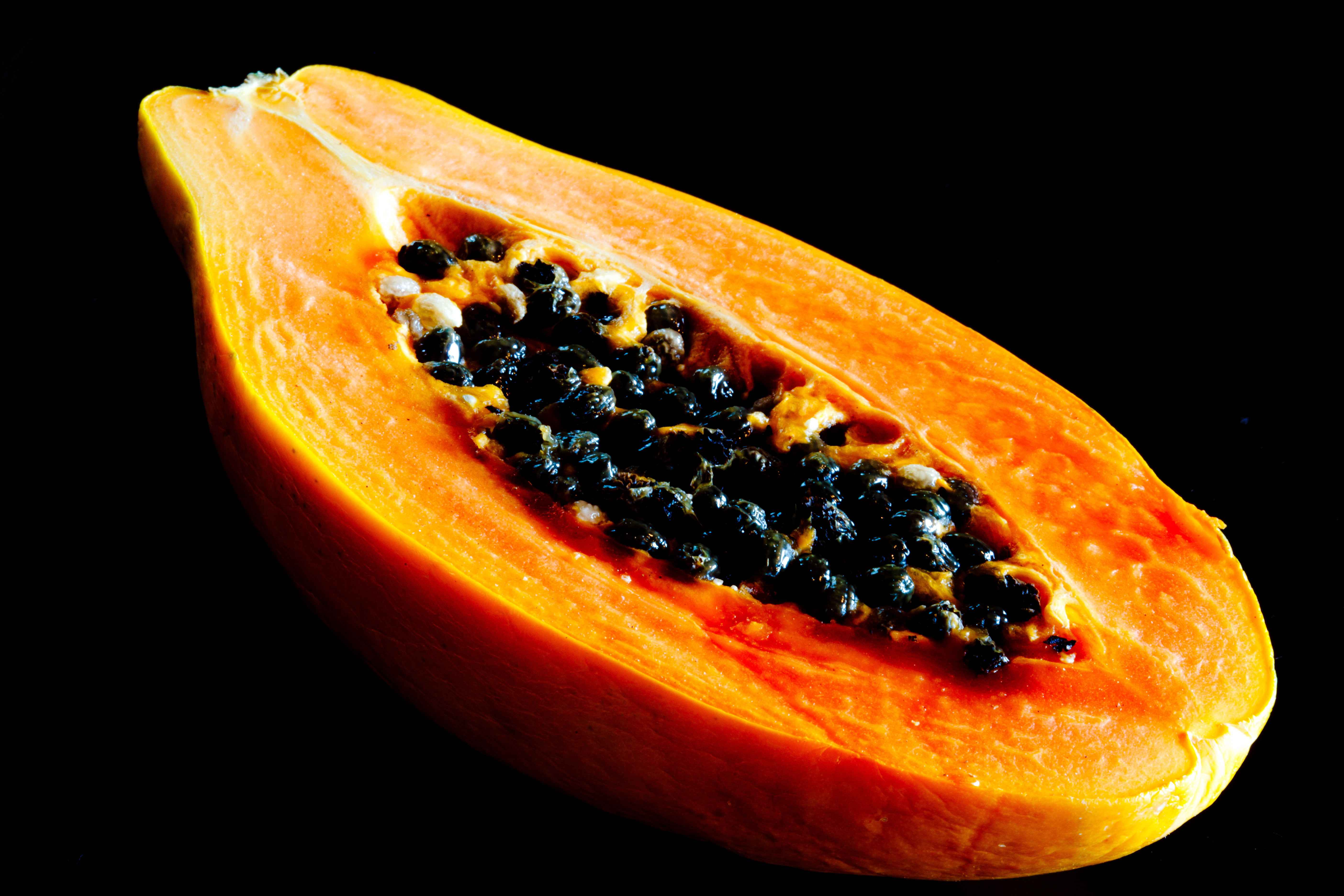Slice of papaya with black background HD wallpaper | Wallpaper Flare