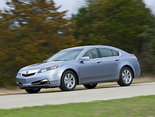 selective focus photograph of gray Acura sedan