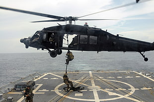 black and gray compound bow, Sikorsky UH-60 Black Hawk, sea, soldier, military HD wallpaper