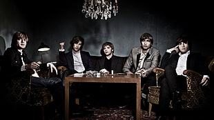 five man group band sitting on couch and armchairs HD wallpaper