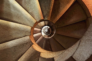 high angle photography of brown staircase