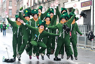 people in green jumpsuit costume near building at daytime HD wallpaper