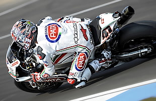 sports photography of motorcycle racer in white and red gear HD wallpaper