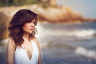 woman beside ocean photo