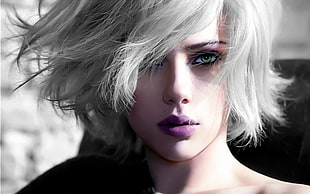 closeup photo of woman with purple lipstick