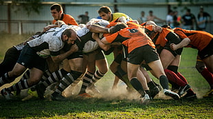 men's orange-and-black jerseys, rugby, sports, Scrum