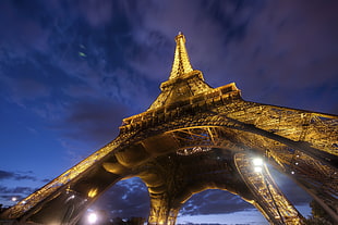 worms eye view of Eiffel tower during nighttime
