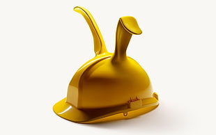 hard hat with bunny ears on white surface