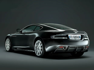 photo of black Aston Martin coupe on black surface digital wallpaper HD wallpaper