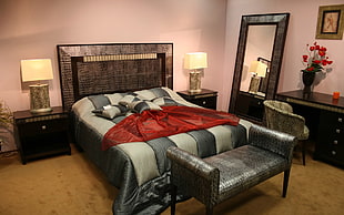red textile on top of gray bed HD wallpaper