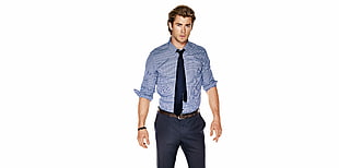 man in blue and white dress shirt and dress pants