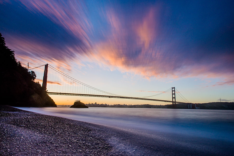 timelapse photo of golden gate during sunset HD wallpaper