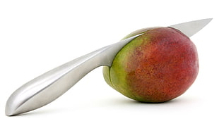 gray metal knife slice on mango HD wallpaper