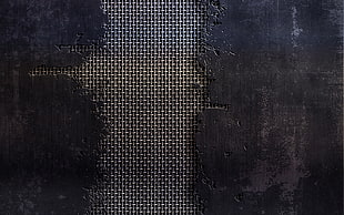closeup photo of distressed black leather