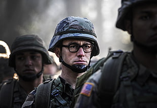 man wearing black framed eyeglasses and soldier uniform