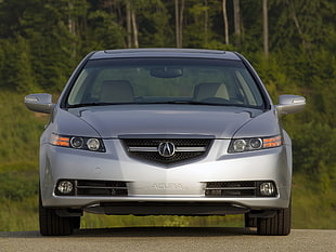 silver Acura TL on road