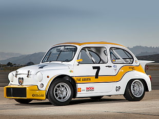 white and yellow FIAT Abarth car during daytime
