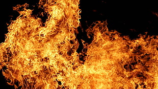 photo of fiery flame with black background