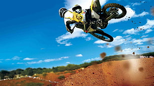 yellow, white, and black motocross dirt bike, dirt bikes, stunts