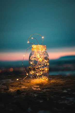 clear glass string light jar