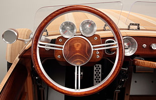 photo of brown vehicle steering wheel
