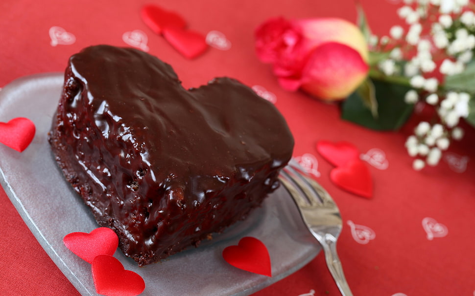 heart-shaped chocolate cake with fork beside HD wallpaper