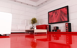 black flat screen TV mounted on white wall